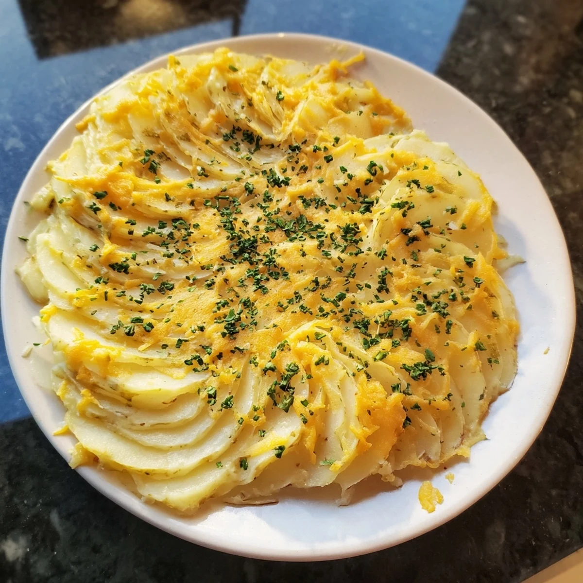 Golden-brown, bubbly Cheesy Scalloped Potatoes, a comforting Southern side dish, rich and creamy.
