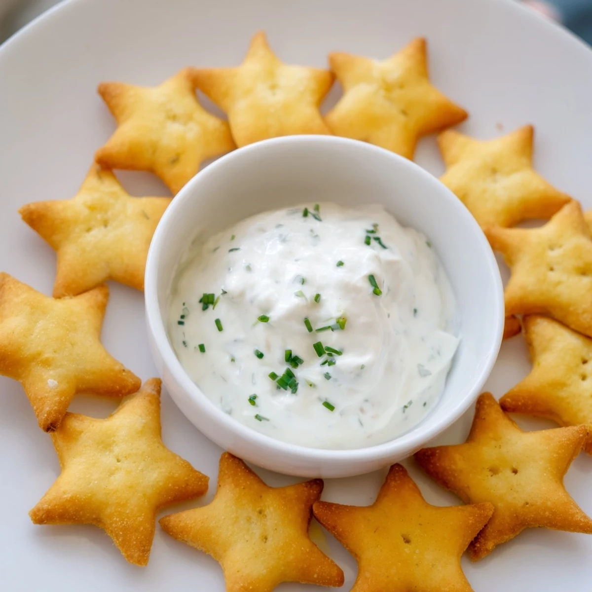 Crisp Holiday Crackers are perfect bite-sized appetizers, ideal with a flavorful, creamy dip center.