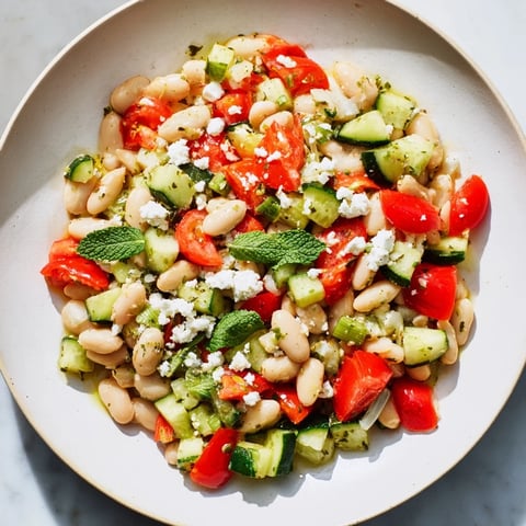 Mediterranean White Bean Salad with Feta, bursting with color and flavor, ready to serve.