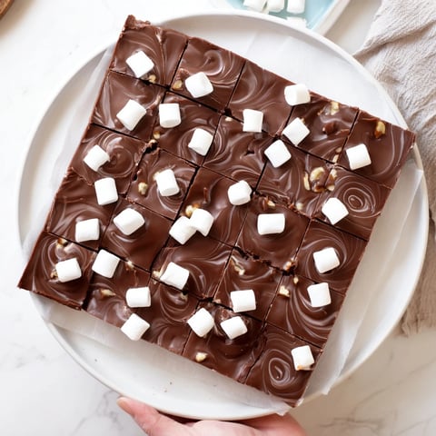 A close-up of creamy, smooth 5-Minute Marshmallow Fudge, perfect for satisfying your sweet tooth.