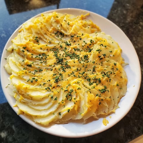 Golden-brown, bubbly Cheesy Scalloped Potatoes, a comforting Southern side dish, rich and creamy.