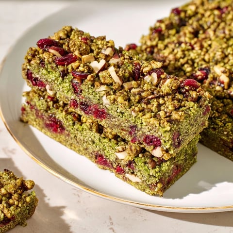 Golden-topped Matcha Cranberry Oat Crumble Breakfast Bars, a wholesome treat with tart cranberries and earthy matcha.