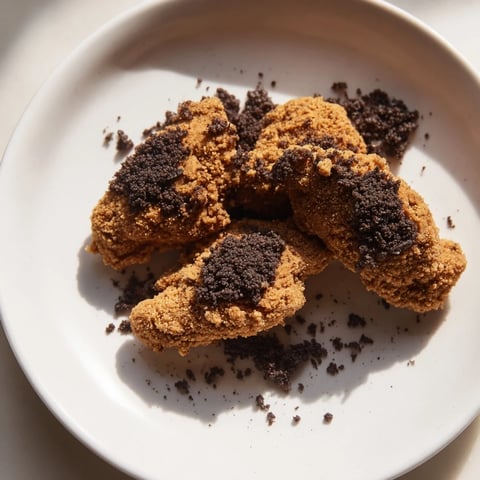 Golden-brown, crispy DIY KFC Oreo Krusher-inspired fried chicken tenders with a sweet, crunchy exterior.