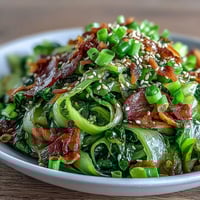 Spicy cabbage stir fry with crisp-tender cabbage, chili, and garlic in a savory soy-based sauce.  